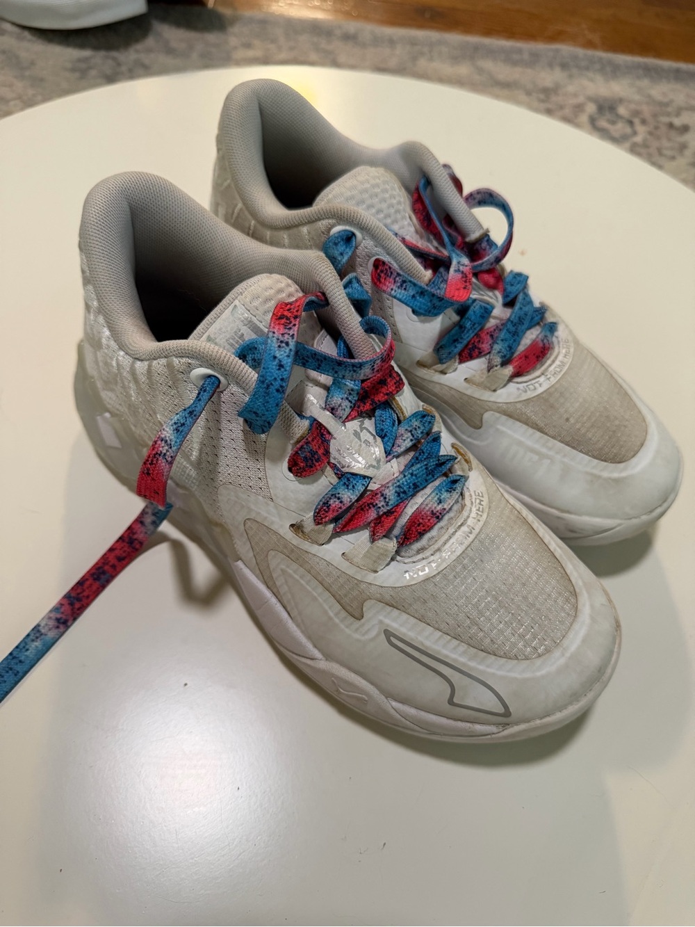 Kids Puma basketball Melo White Athletic Sneakers with Blue & Red Laces